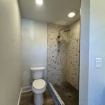 Bathroom remodel with new lighting and receptacles