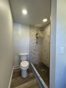 Bathroom remodel with new lighting and receptacles