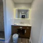 Bathroom remodel with new can light, switches and receptacles.
