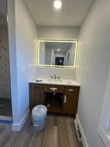 Bathroom remodel with new can light, switches and receptacles.