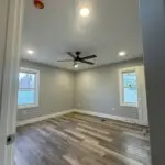 Bedroom upgrade with new receptacles, fan, lights and smoke detector.