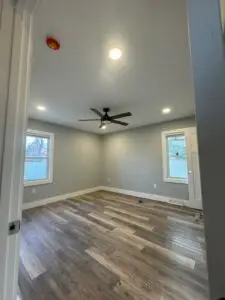 Bedroom upgrade with new receptacles, fan, lights and smoke detector.
